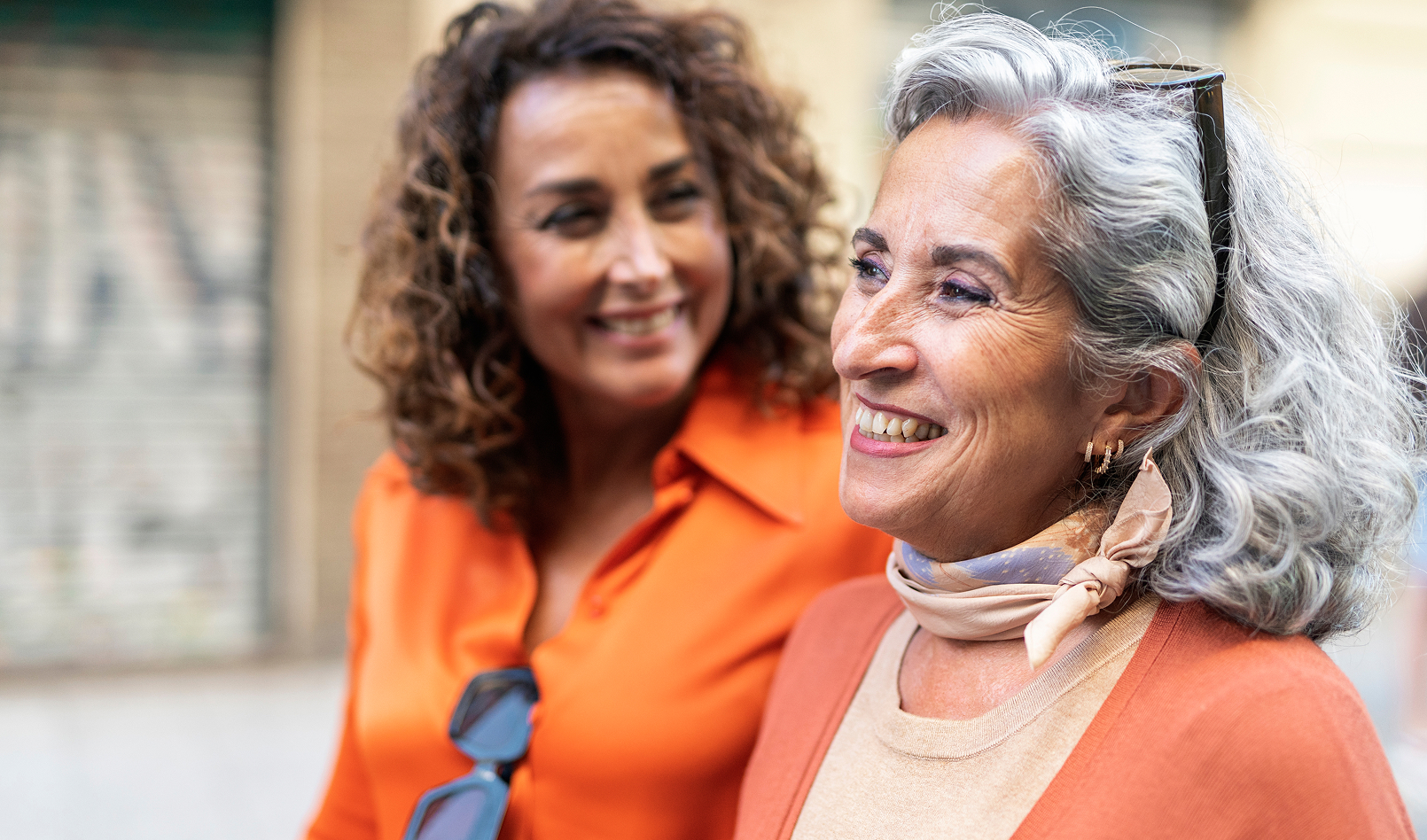 Two women discussing investing options