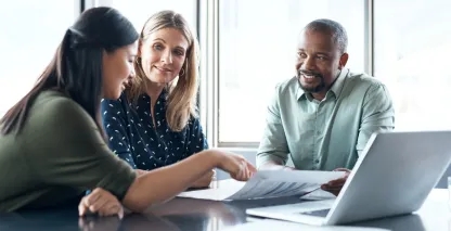 Small business owners choosing a business bank.