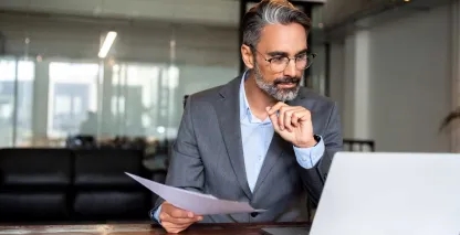 An accountant paying invoices