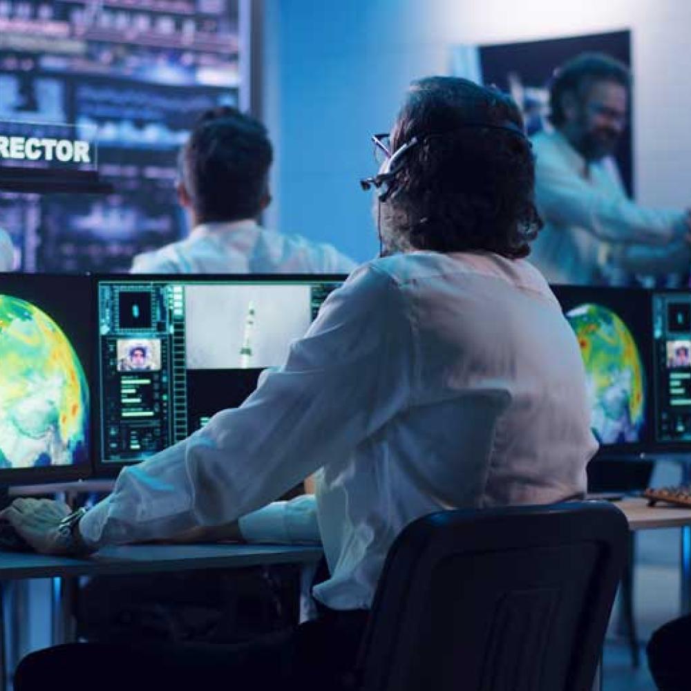 A flight director in an air defense control room