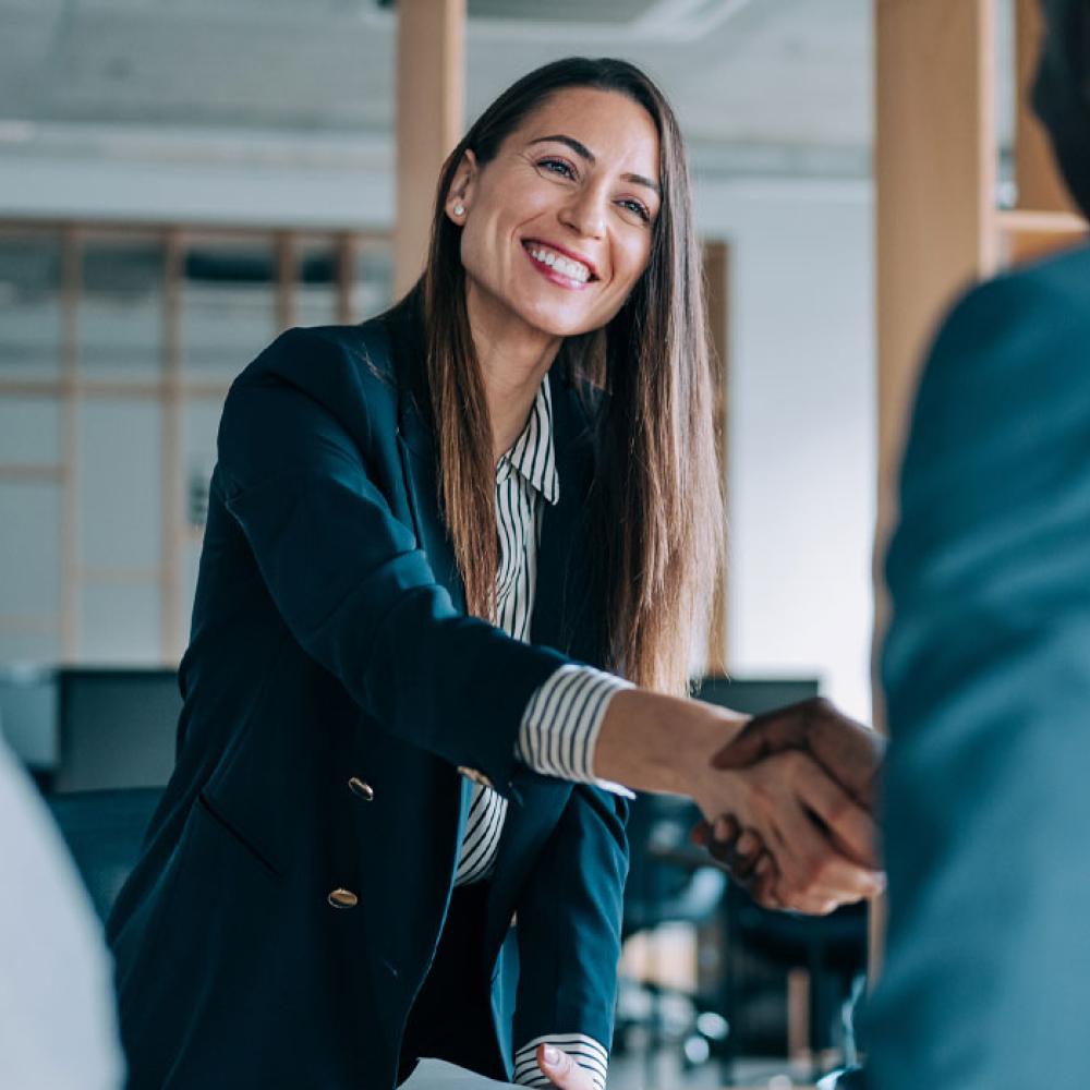 A sponsor finance specialist meeting with clients